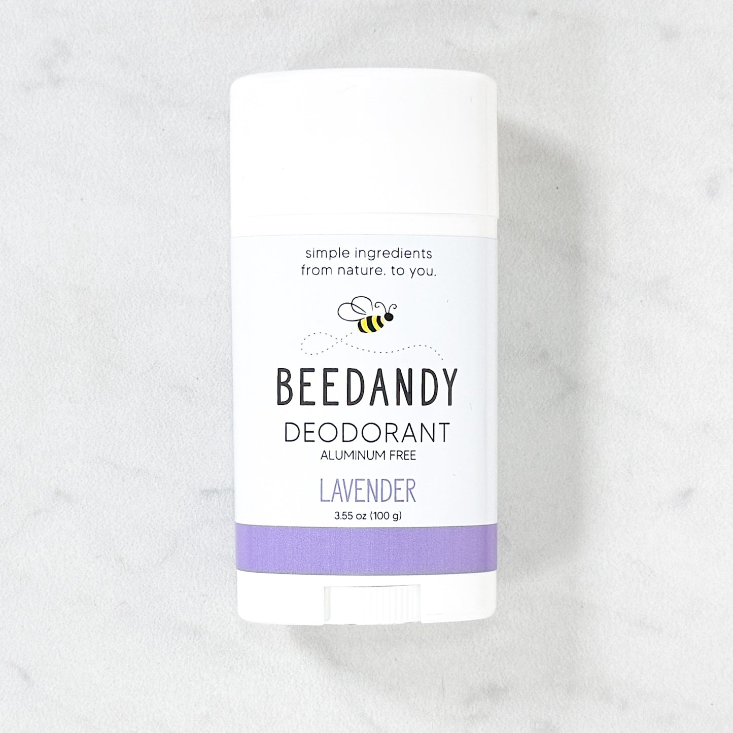 Beedandy lavender aluminum-free deodorant stick displayed on a light background.