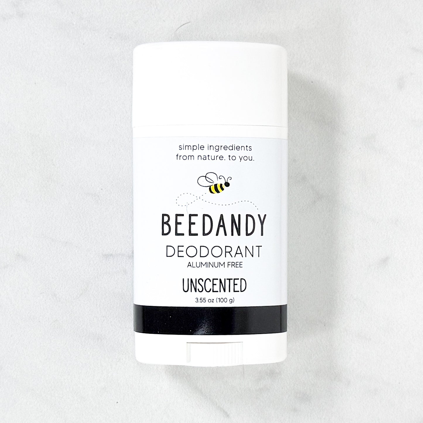 Beedandy unscented aluminum-free deodorant stick displayed on a light background.