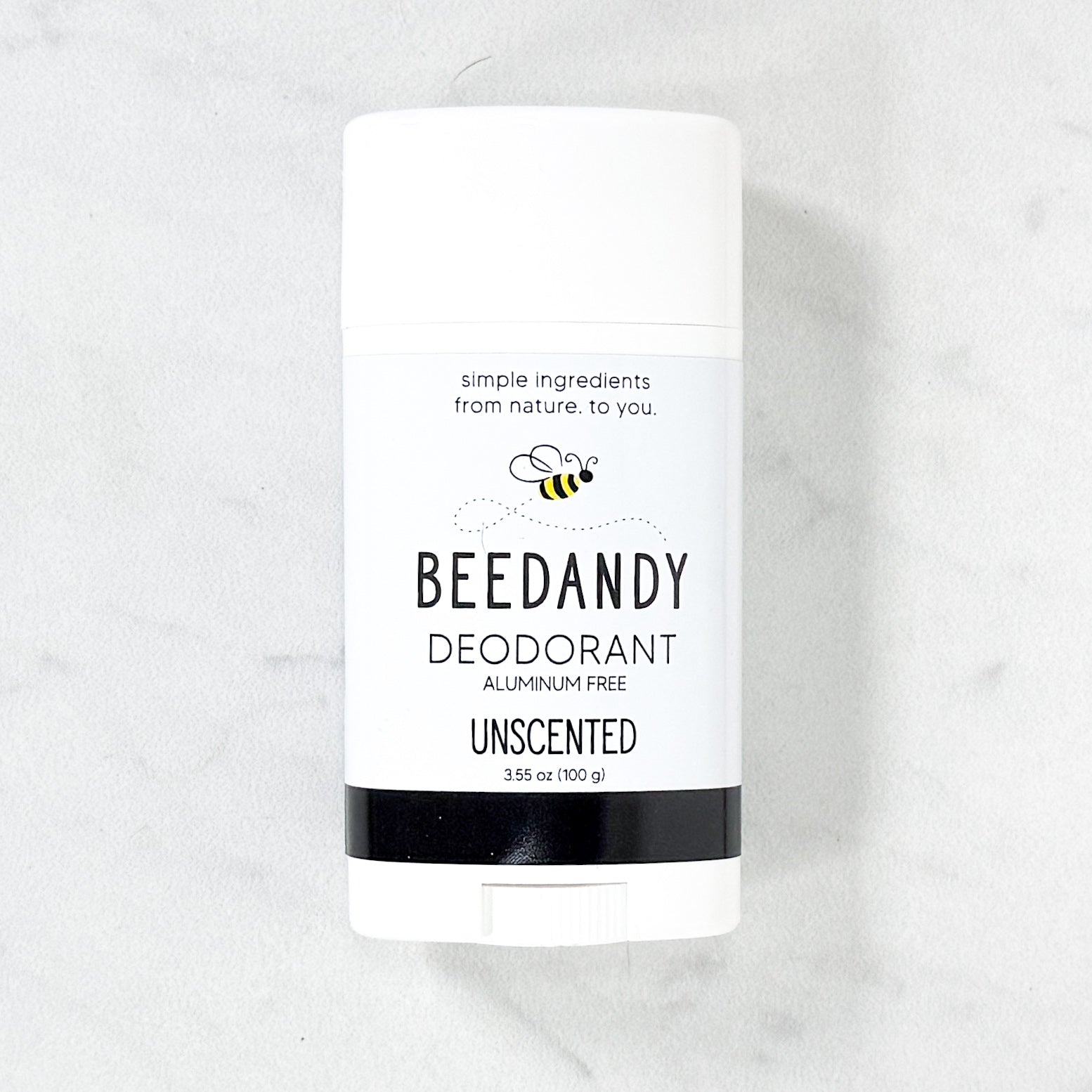 Beedandy unscented aluminum-free deodorant stick displayed on a light background.