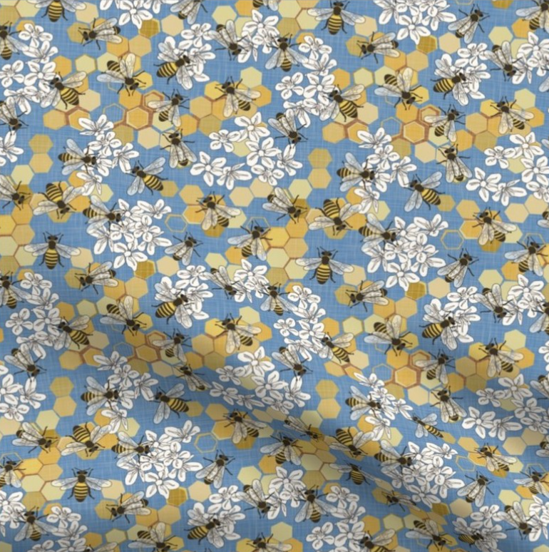 blue fabric with bee and honeycomb print