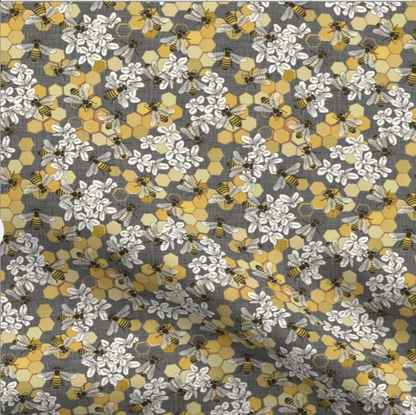 grey fabric with bee and honeycomb print