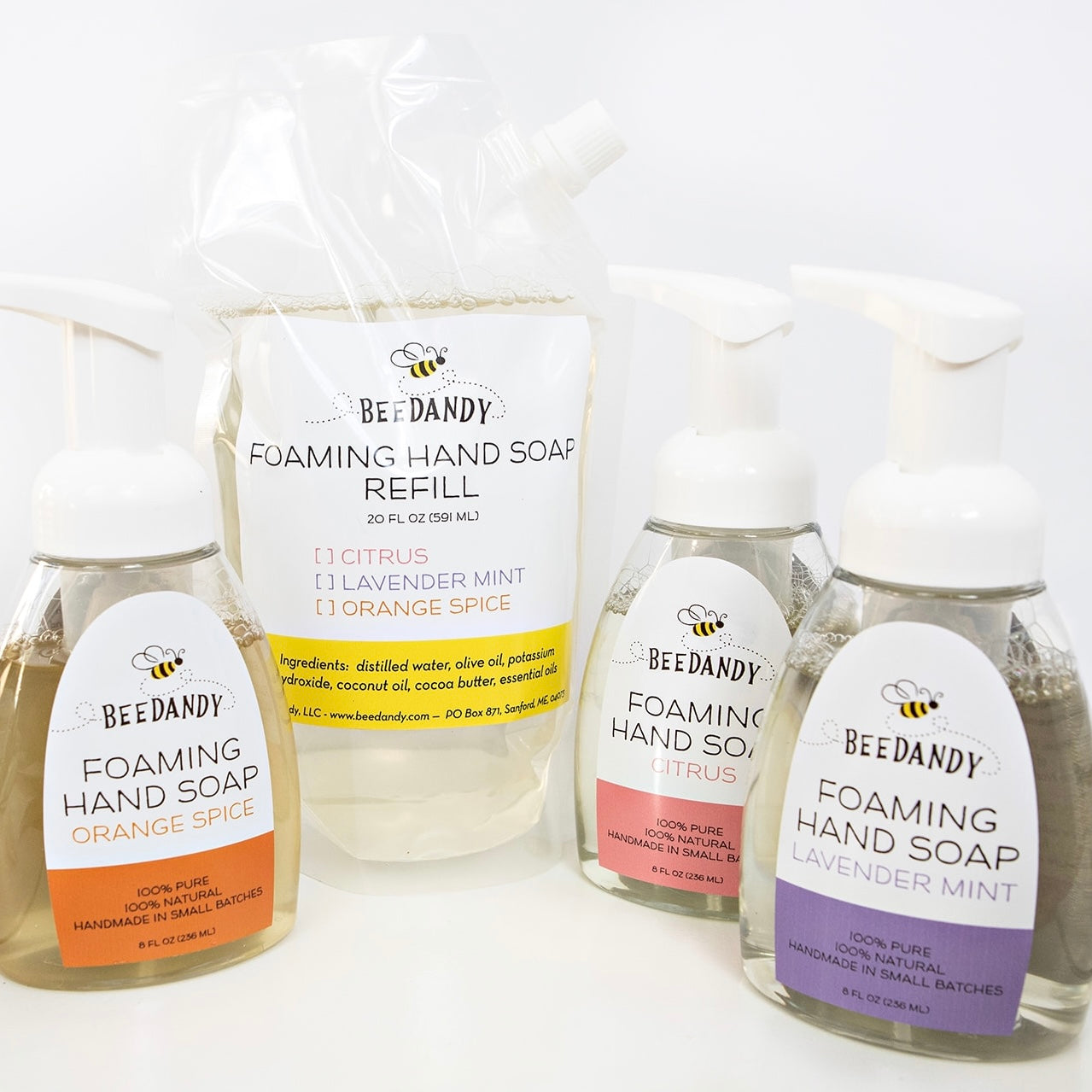 Beedandy foaming hand soap bottles in multiple scents displayed with a foaming hand soap refill pouch on a white background.