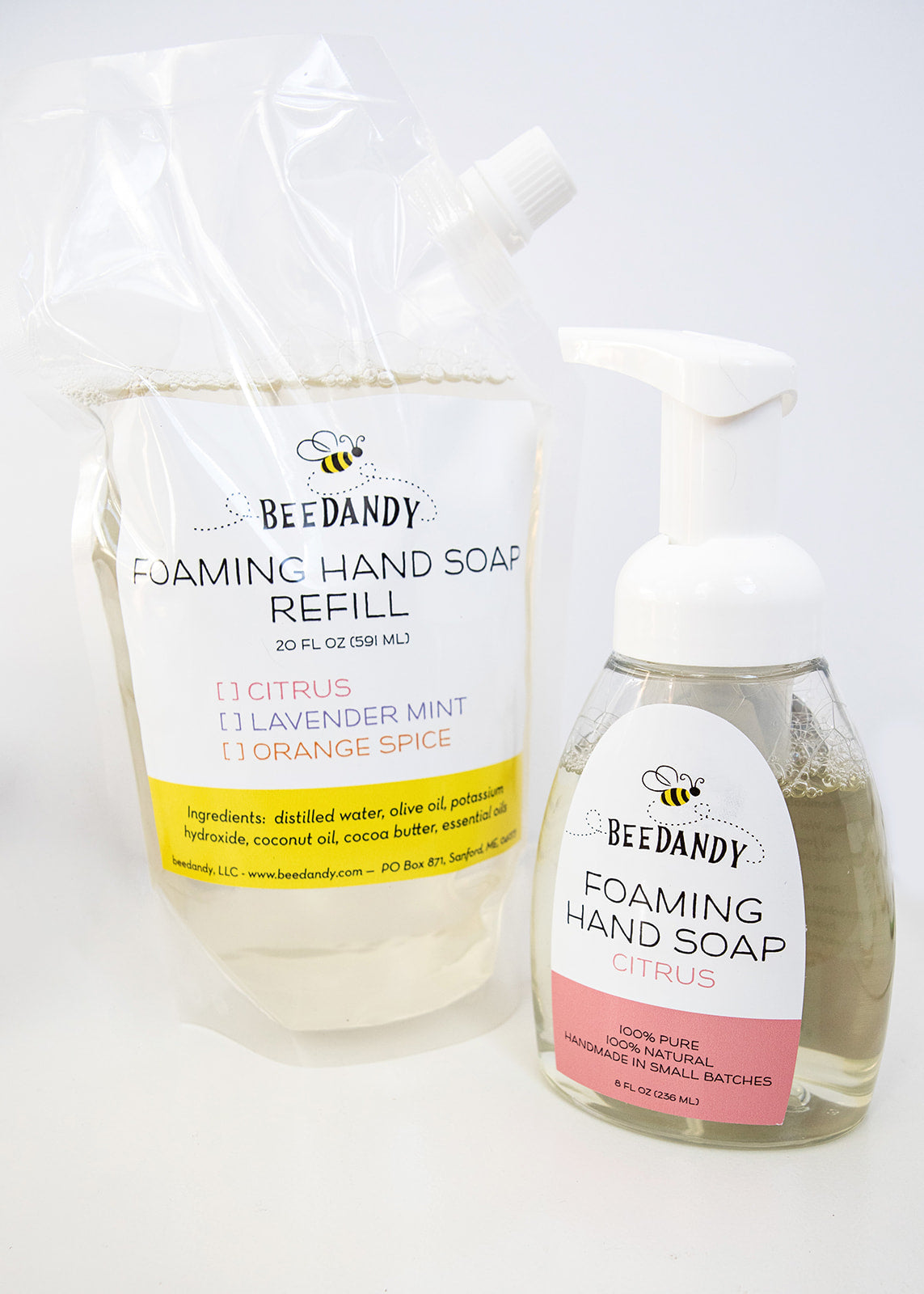 Beedandy foaming hand soap bottle in Citrus scent displayed with a foaming hand soap refill pouch on a white background.